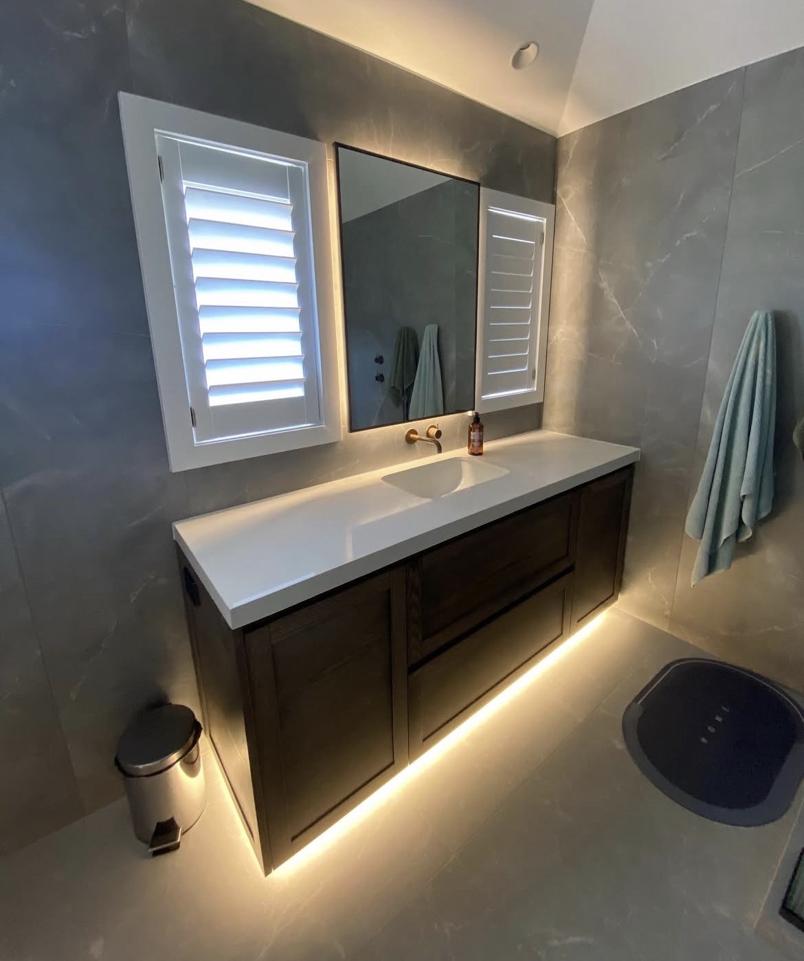 Floating vanity under-cabinet lighting by Knight Electrical Solutions