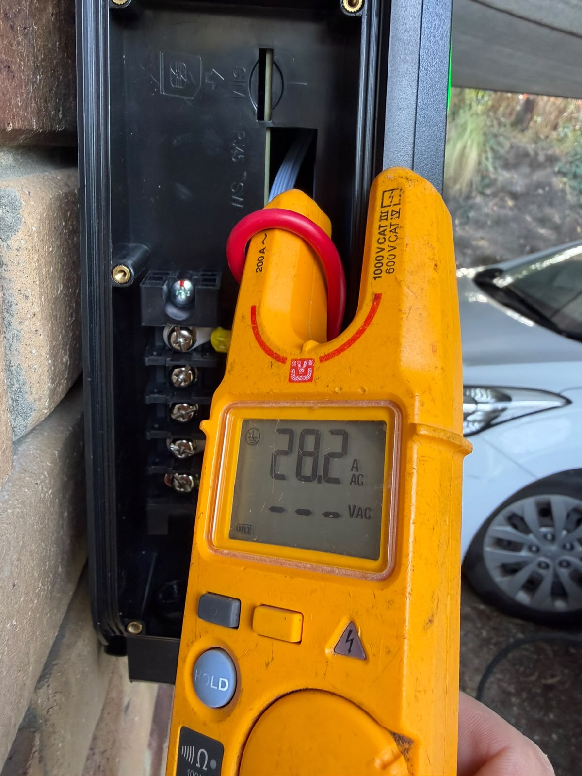 EV charger load testing with a clamp meter by Knight Electrical Solutions